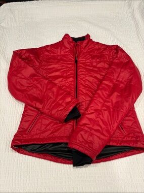 Sugoi Women’s Bright Red Quilted Puffer Jacket
Size M